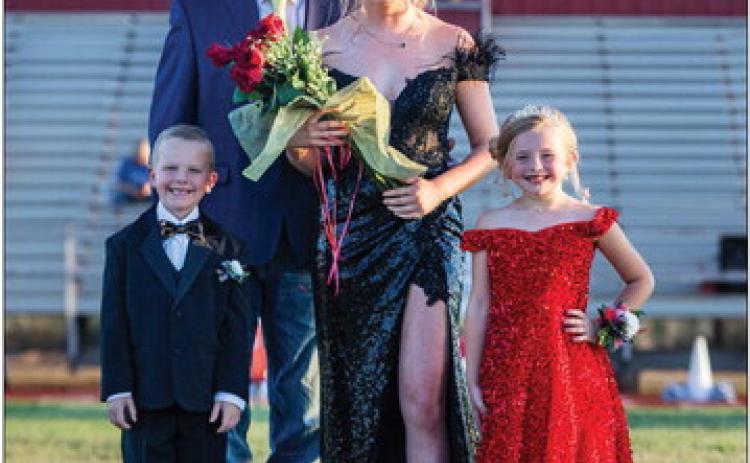 Aspermont's 2023 Homecoming Queen Georgia Fraser was escorted by her father Matt Fraser (Class of '96). The crown and flowers were presented by AISD students Nash Myers and Scarlett Flowers.