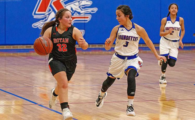 Lady Yellowhammer Zoe Flores races down the court after recovering from an injury sustained during the volleyball that prohitied her from playing for the majority of this basketball season.