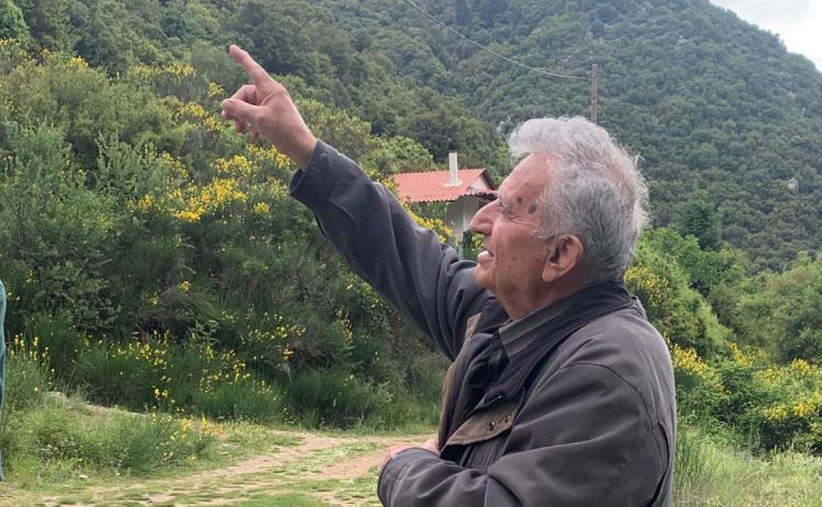 Panagiotis Panagiotopoulos points to where his father rescued our father 80 years ago.