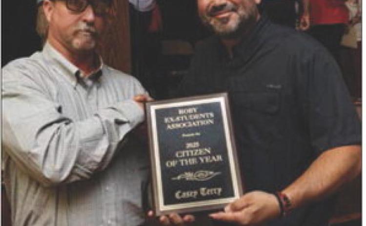 Fisher County Commissioner and Roby Alumni Class of ‘99 Micah Evans presented the Roby Ex- Student Association Citizen of the Year award to Casey Terry Class of ‘96 during the Ex’s Program held on Saturday afternoon at the Roby CISD Auditorium.