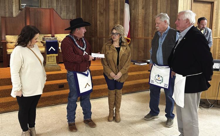 Masons donate funds for children’s advocacy