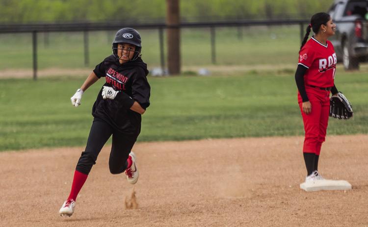 Aspermont senior Leah Salazar races for 3rd base during the Lady Hornets 15-5 win over the Roby Lady Lions last Friday. The Lady Hornets are currently 2-3 in district play and will wrap up their district schedule with a home game against Trent next Wednesday at 4pm. PHOTO BY: MARK MARTINEZ