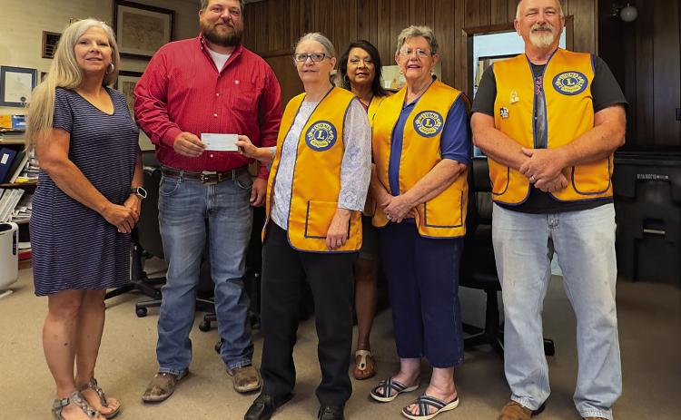 Rotan City Administrator Carla Thornton, Rotan Mayor Zach Johnson, Lion Club Members Carolyn Hargrove, Linda De Los Santos, Fredda Buckner, John Dickson