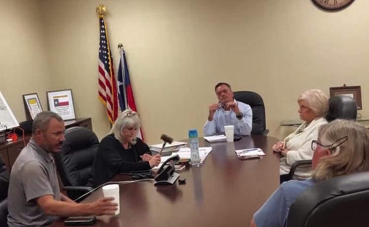 SMHD Board President Ellen Abernathy brings the meeting back into order during one of the numerous confrontations between board members during Tuesday's special called meeting.