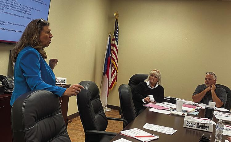 SMHD Board President Ellen Abernathy and CEO Michael Moorhead listen closely as Deborah Whitley, financial advisor with Forvis, shares insights into district finances and what’s on the horizon for healthcare.