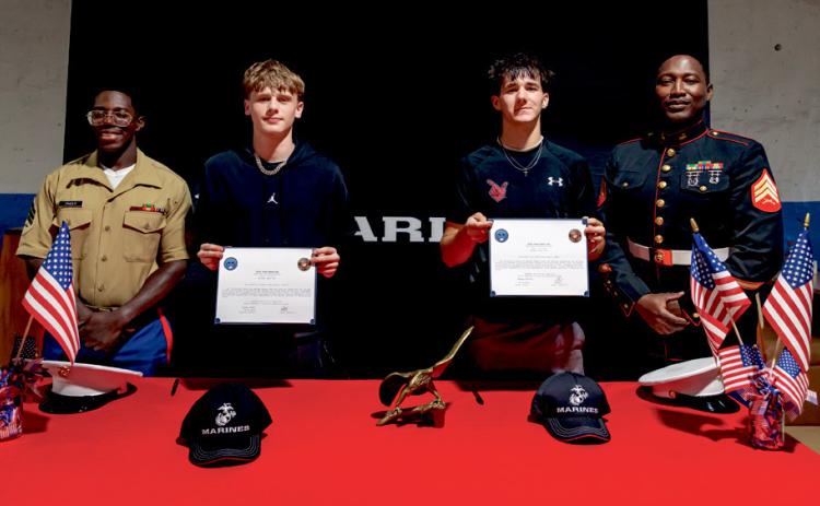 HAMMER GRADUATES SIGN ON THE DOTTED LINE