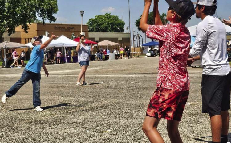 Participants launch eggs and laughter during the hourly toss at last year's Aspermont’s Flag and Family Fun Day.. Photo submitted by Ellen Abernathy