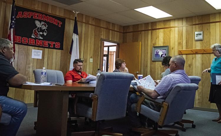 Abilene Meals on Wheels Executive Director Betty Bradley shares information with Aspermont City officials on Tuesday, saying that the program has grown but needs volunteer effort and financial assistance.